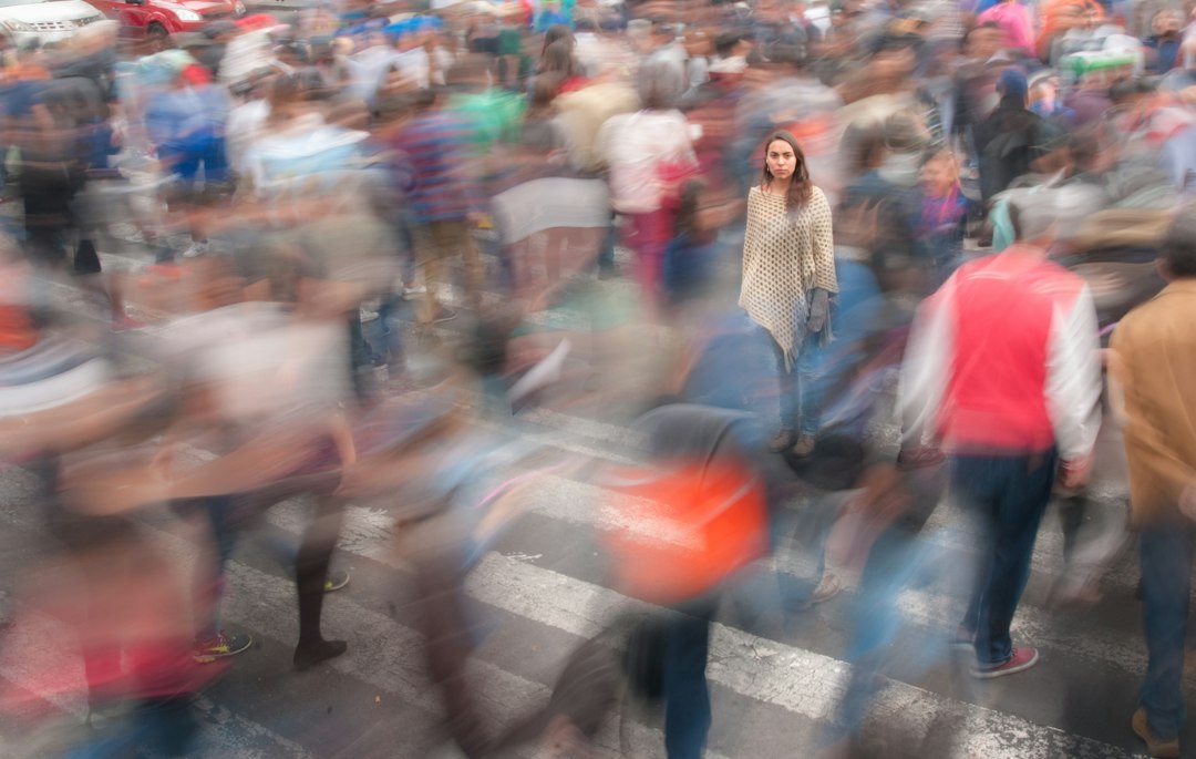 people walking on street during daytime city crowd smartphones wireless signals device tracking