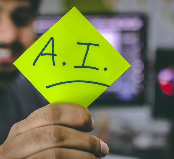 Top 7 Books Every CEO Should Read in 2026 2 person holding green paper artificial intelligence human conversation digital assistant