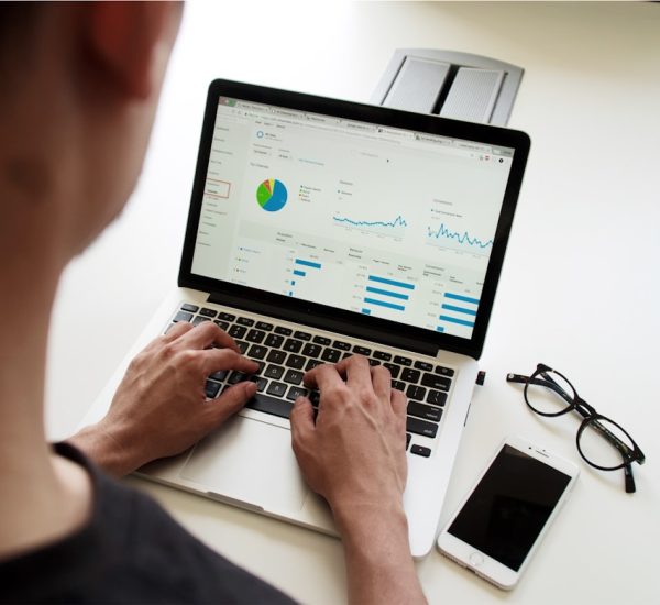 Salesforce Account Matching by Email Domain: Best Practices and Tools 4 person using macbook pro technician reviewing email reports security charts client domains