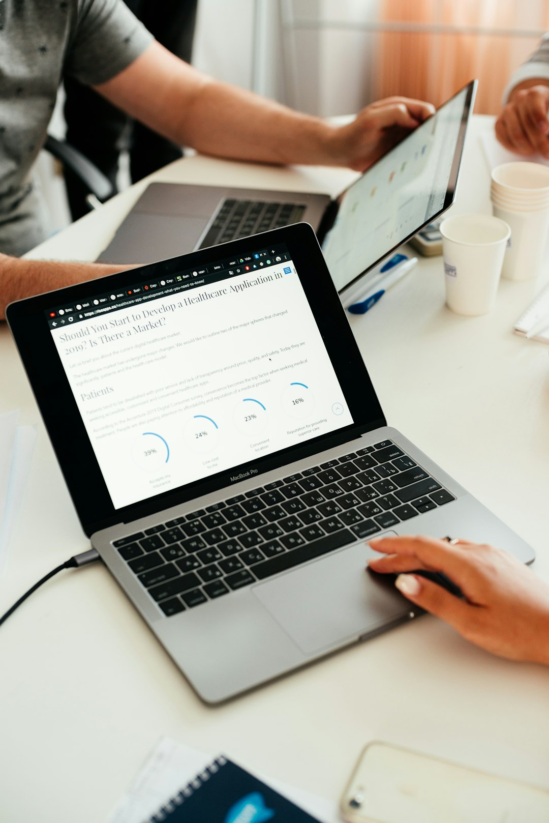 person using macbook secure client portal document sharing business communication