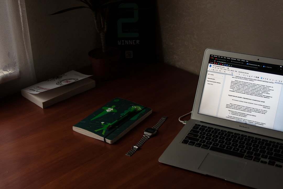 turn on macbook air near books translator workspace reference books multilingual screen
