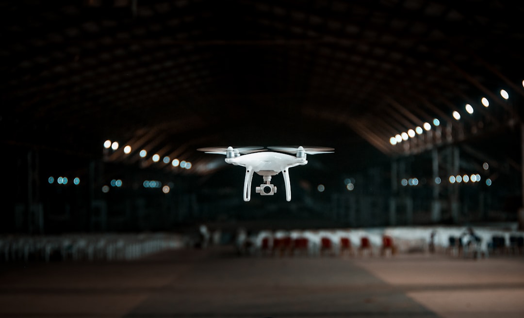 white drone in a building indoor drone lidar map robot localization sensor fusion