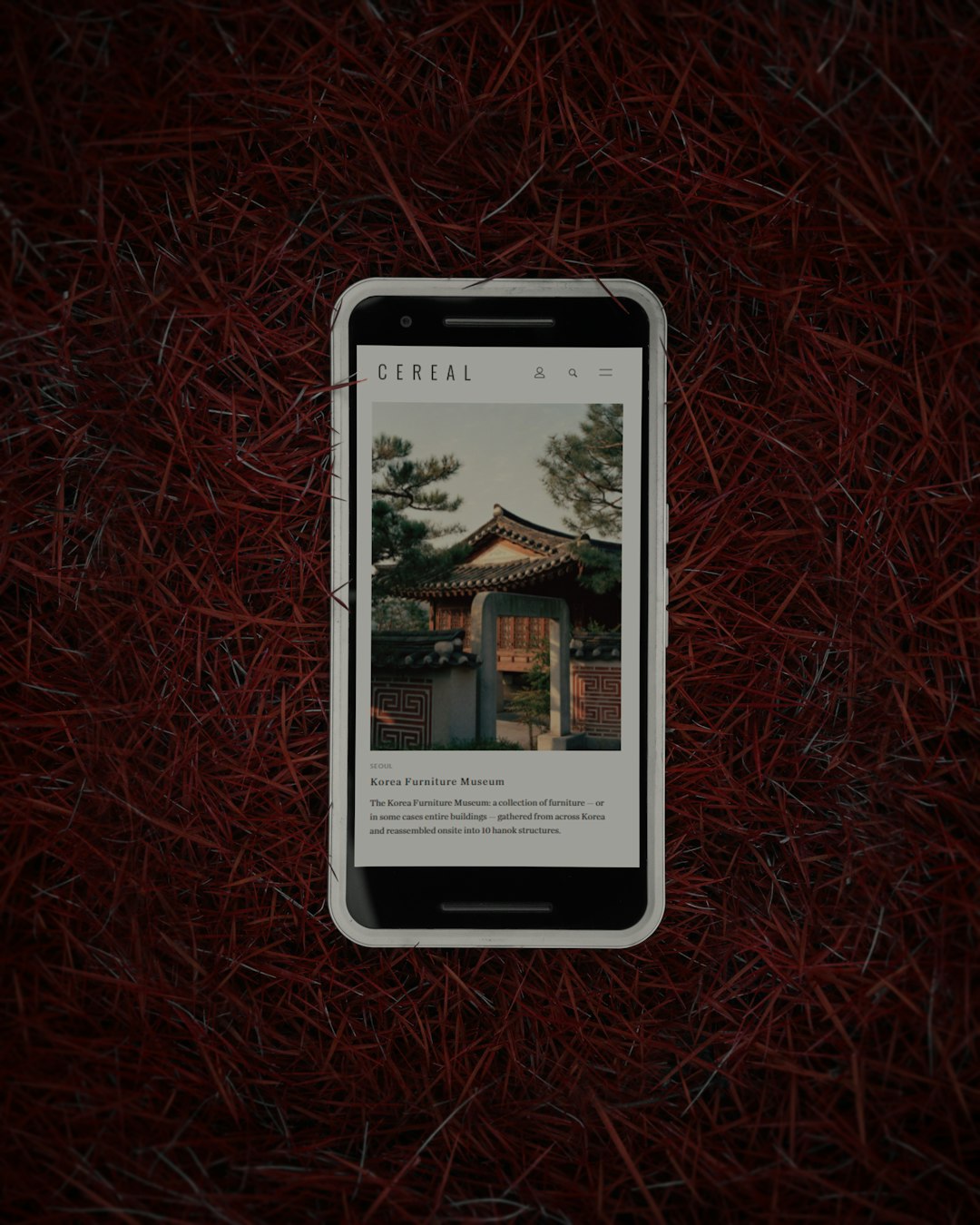white samsung galaxy smartphone on red textile content cards link preview mobile news feed ios design