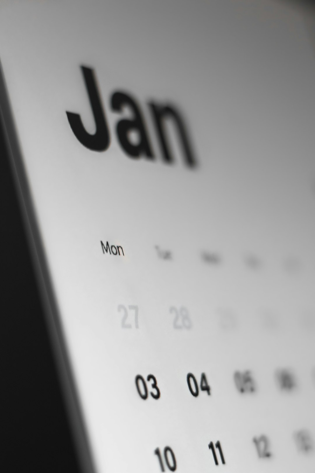 a black and white photo of a calendar editorial calendar blog posts content team digital marketing