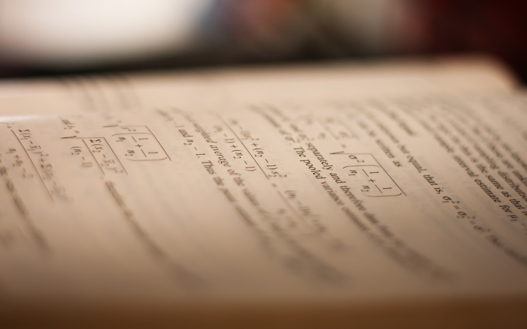 a close up of a piece of paper on a table student solving math worksheet answers algebra notebook