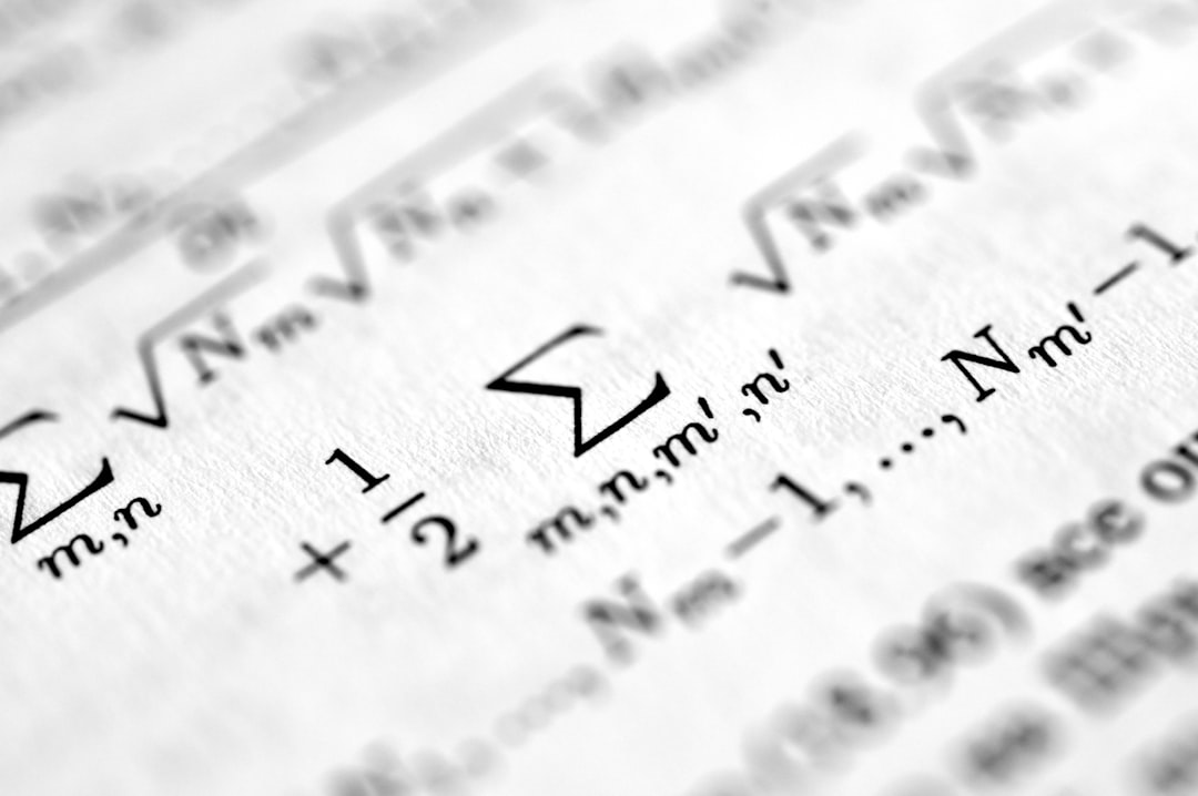 a close up of a sheet of paper with numbers on it sum formula algebra notebook calculator