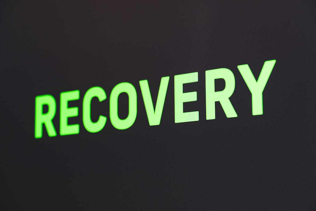 a close up of a sign that reads recovery service outage technical support system recovery