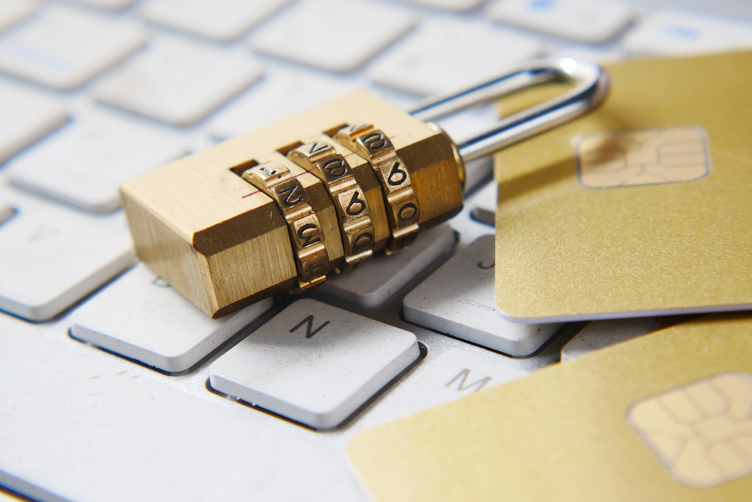 a golden padlock sitting on top of a keyboard online security privacy shield payment safety