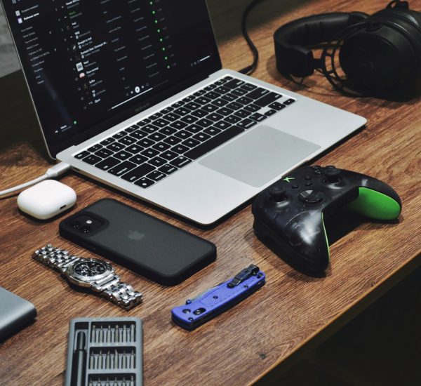 Magento Speed Tips to Improve Store Performance 8 a laptop computer sitting on top of a wooden desk software pricing table subscription plans saas tools