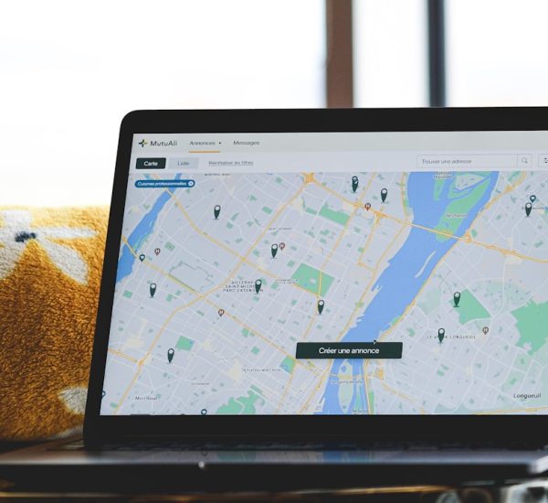 Moz Local vs Yext: Which Local SEO Platform Is Better? 8 a laptop with a map on the screen local search business listings map results