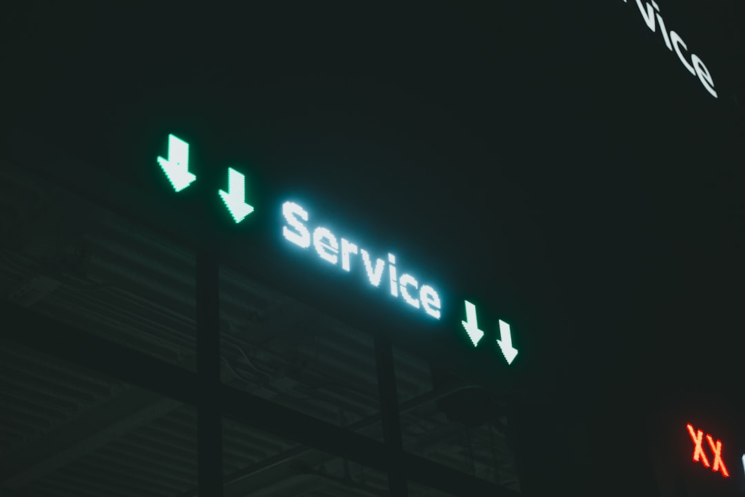 a lit up sign that says service i and x service outage technical support system recovery
