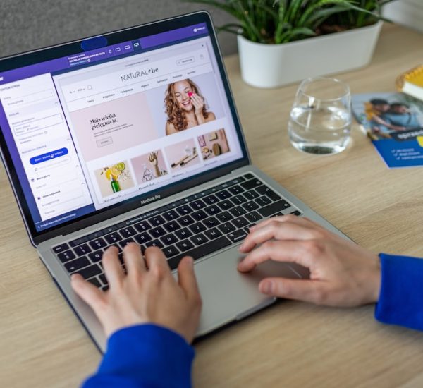 ChatGPT: 10 Ways to Use ChatGPT More Effectively 16 a person typing on a laptop on a table ecommerce website laptop shopping cart
