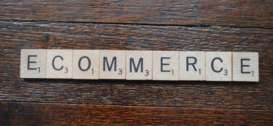 a white and black sign online store analytics mobile commerce