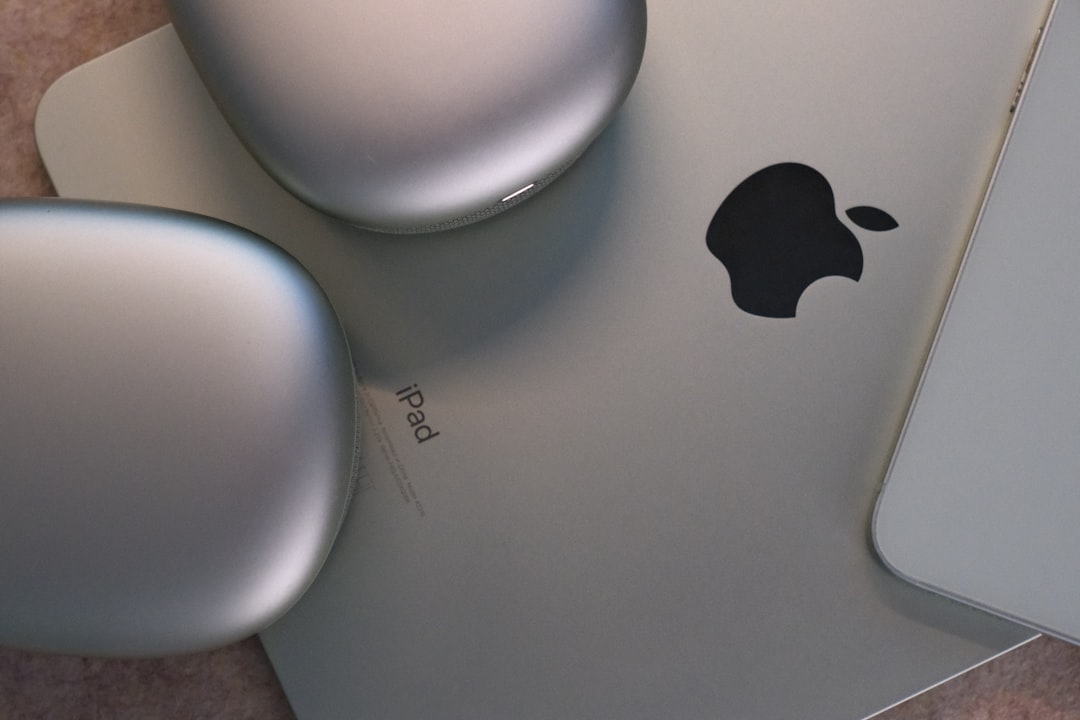 apple ipad and silver airpods max headphones macbook iphone ipad productivity app apple ecosystem