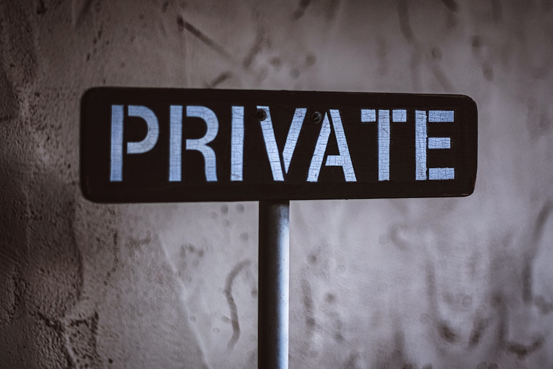 grayscale photo of black and white wooden sign legal compliance privacy rules responsible data