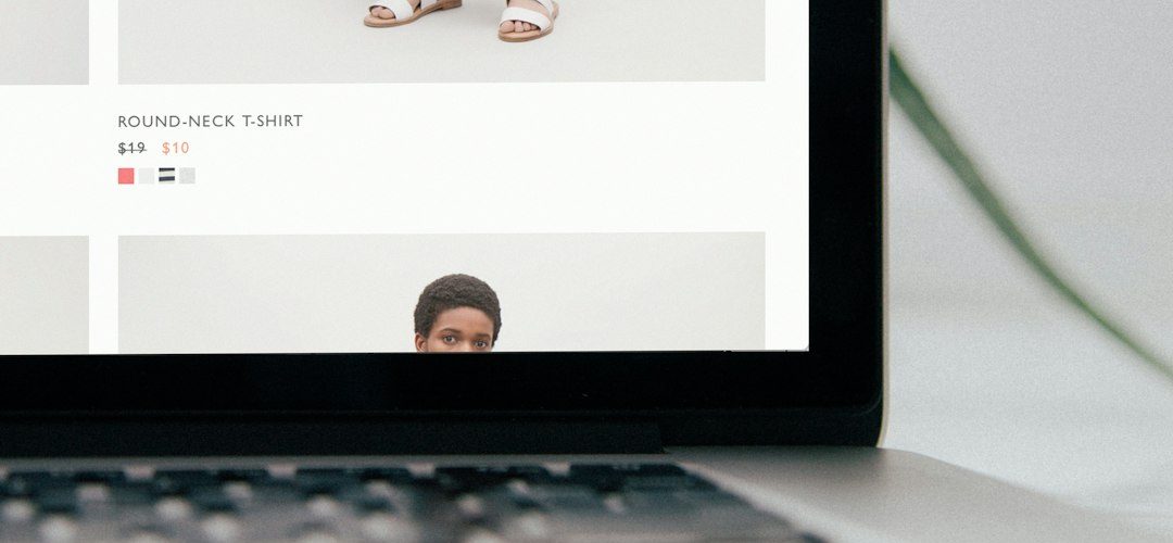 laptop computer displaying mango pants ecommerce website laptop shopping cart