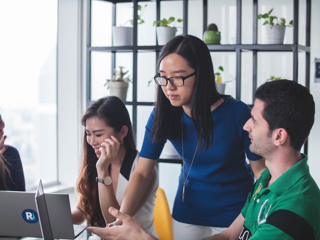 man standing near woman smiling customer support problem solving professional team