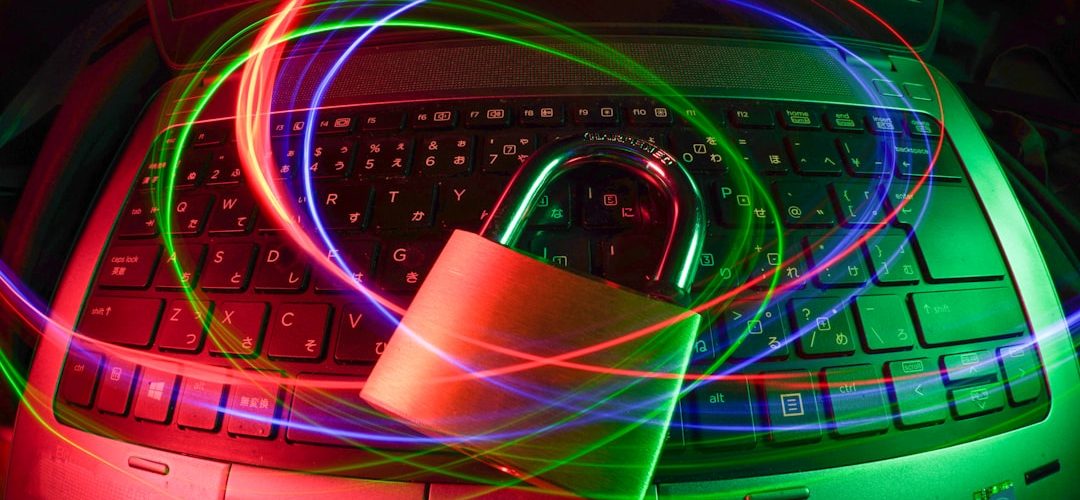 padlock on laptop with light trails zero trust threat detection secure access