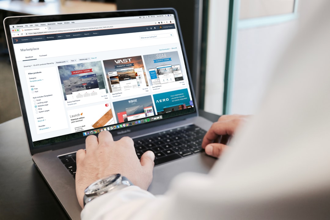 person using macbook pro b2b ecommerce dashboard company accounts online ordering