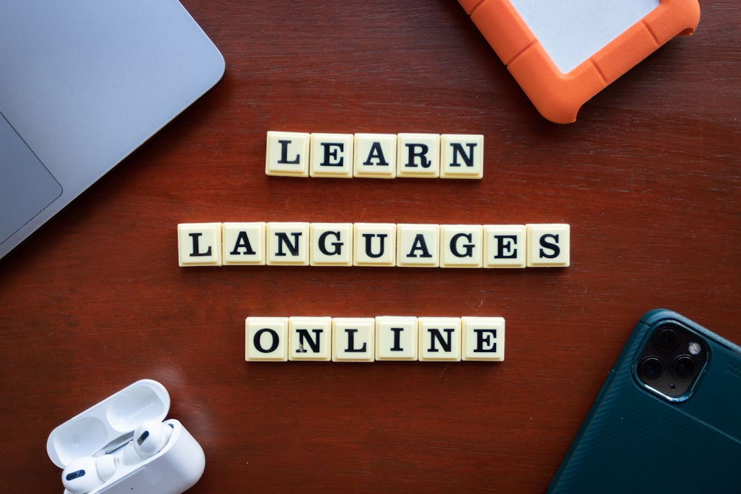 scrabble tiles spelling learn languages on a table localized content language review international marketing