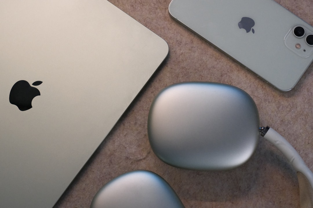 silver apple macbook iphone and airpods max headphones macbook iphone ipad productivity app apple ecosystem