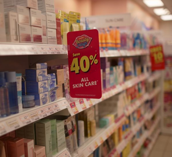 skincare products on shelves with a 40 off sale sign discount store bargain shopping retail shelves