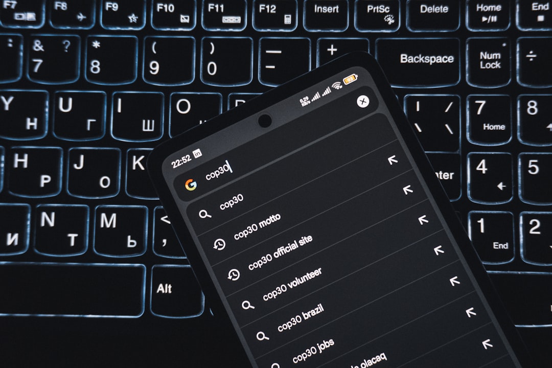 smartphone displaying search results on a keyboard local business website mobile search contact page 1