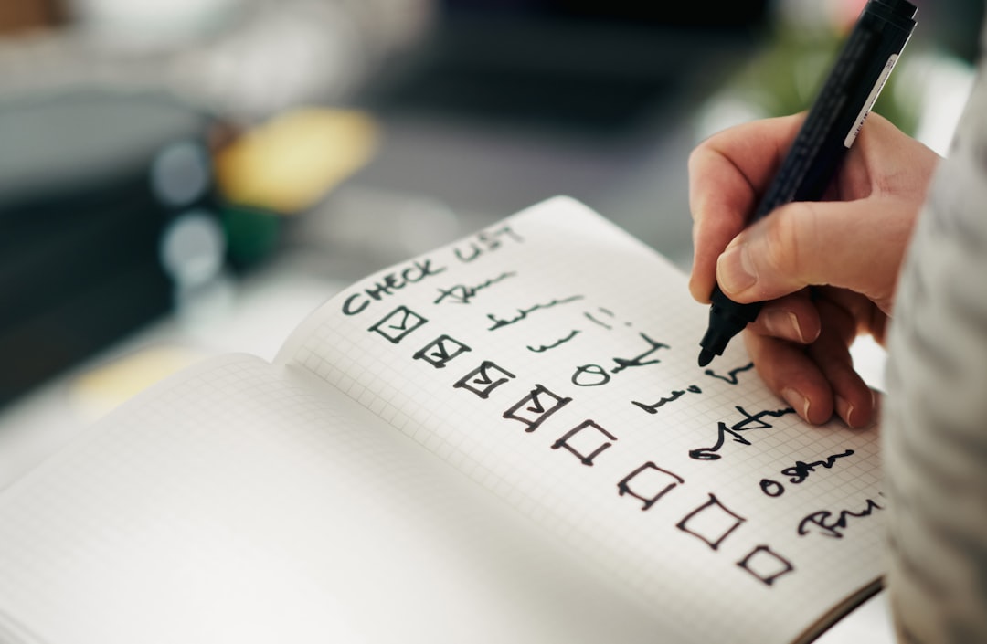 someone is checking items off a checklist today checklist simple planning morning routine