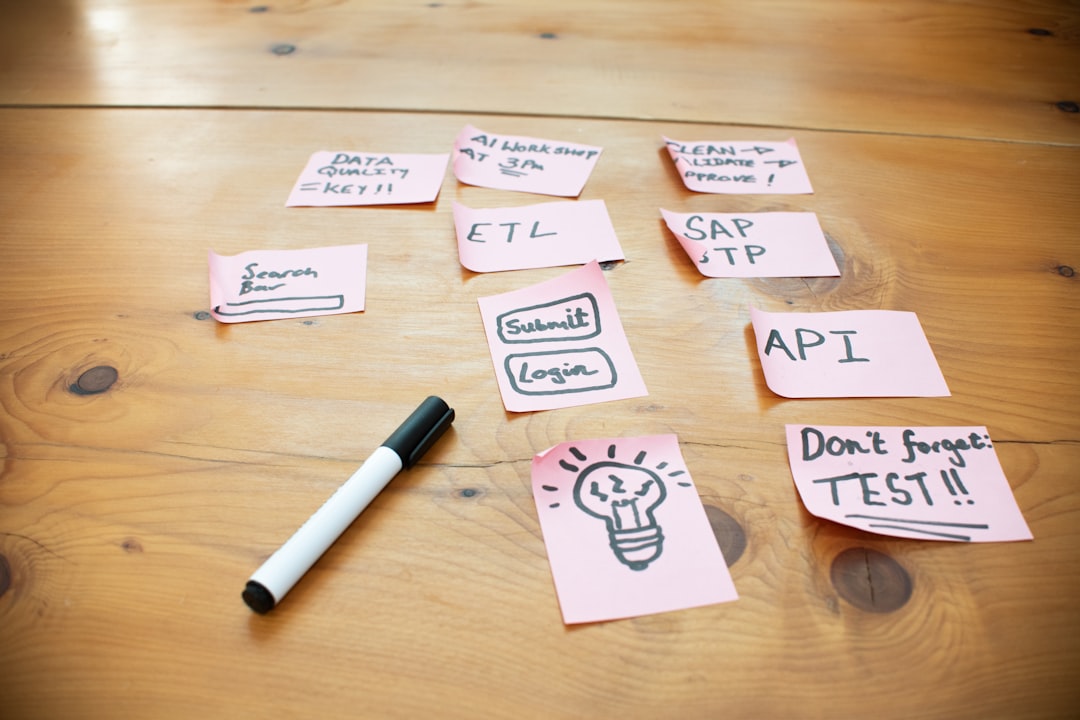 sticky notes with words and drawings on wooden table quality checklist prompt testing process improvement 1