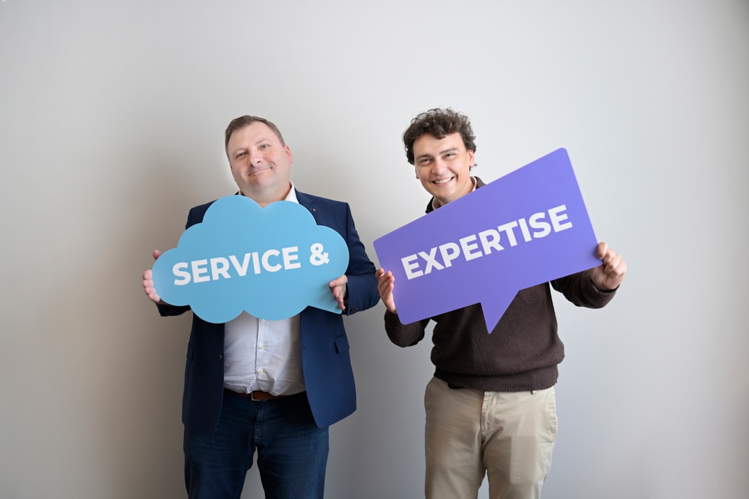 two smiling men holding service and expertise signs fax service comparison pricing chart business software