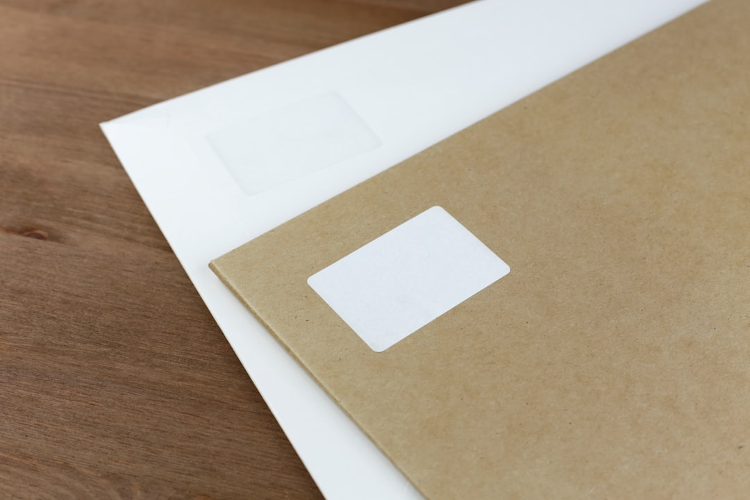 white printer paper on brown wooden table warehouse team shipping labels order fulfillment