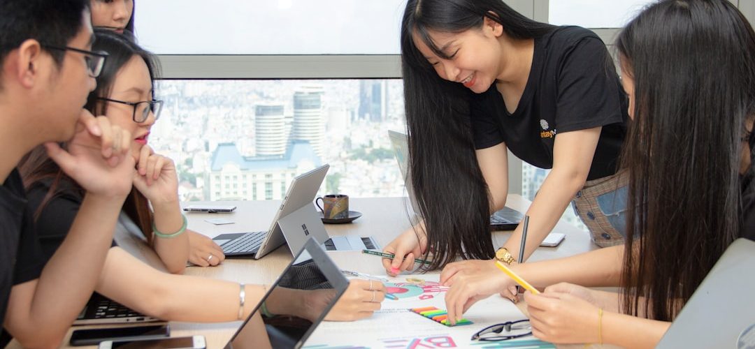 women using laptops customer support training team workshop office coaching