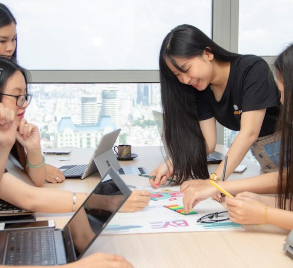 6 Customer Service Role-Play Scenarios for Training New Support Teams 8 women using laptops customer support training team workshop office coaching