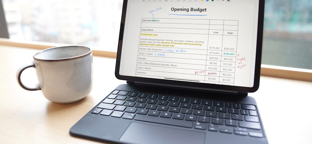 a laptop and a cup of coffee software comparison scheduling apps pricing table