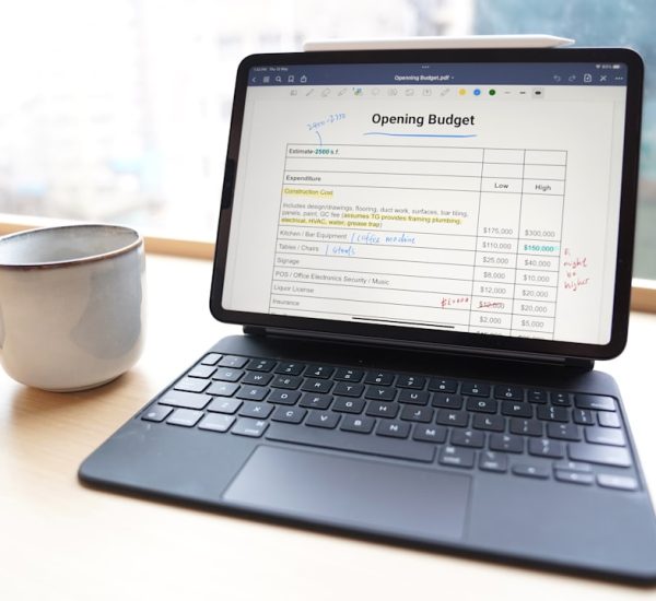 Brand Intelligence Software: Brandwatch vs Meltwater for Brand Intelligence 8 a laptop and a cup of coffee software comparison scheduling apps pricing table