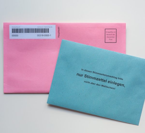 Email Sign-Offs: Grammarly vs Lavender and Other Tools for Writing Better Professional Closings 6 blue envelope on white table email inbox subject lines capitalization examples