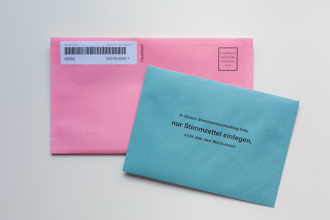 blue envelope on white table email inbox subject lines capitalization