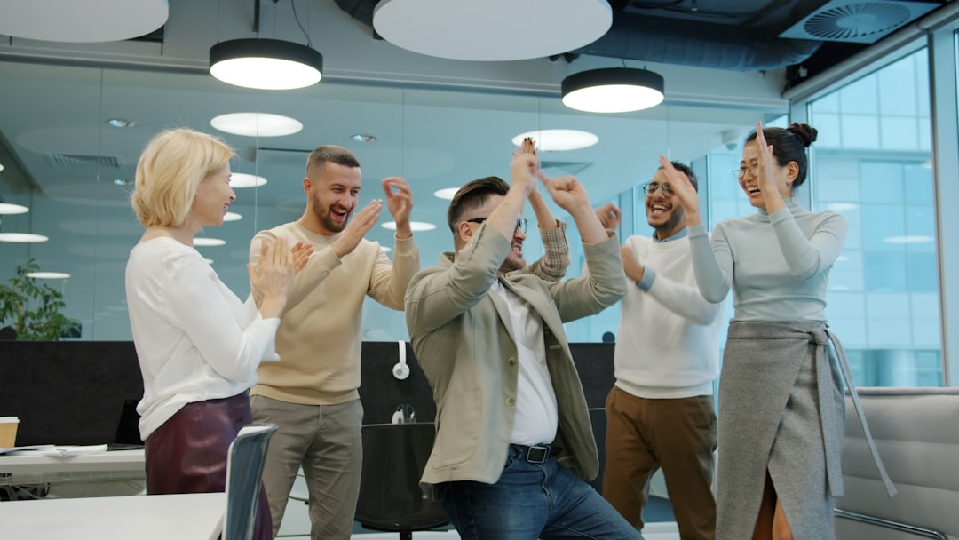 diverse group of colleagues celebrating success in office team collaboration prompt template business process