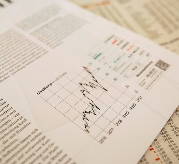 CasePeer Review: Features, Pricing, Integrations, Pros, and Alternatives 8 financial newspaper with stock chart legal analytics charts case reports