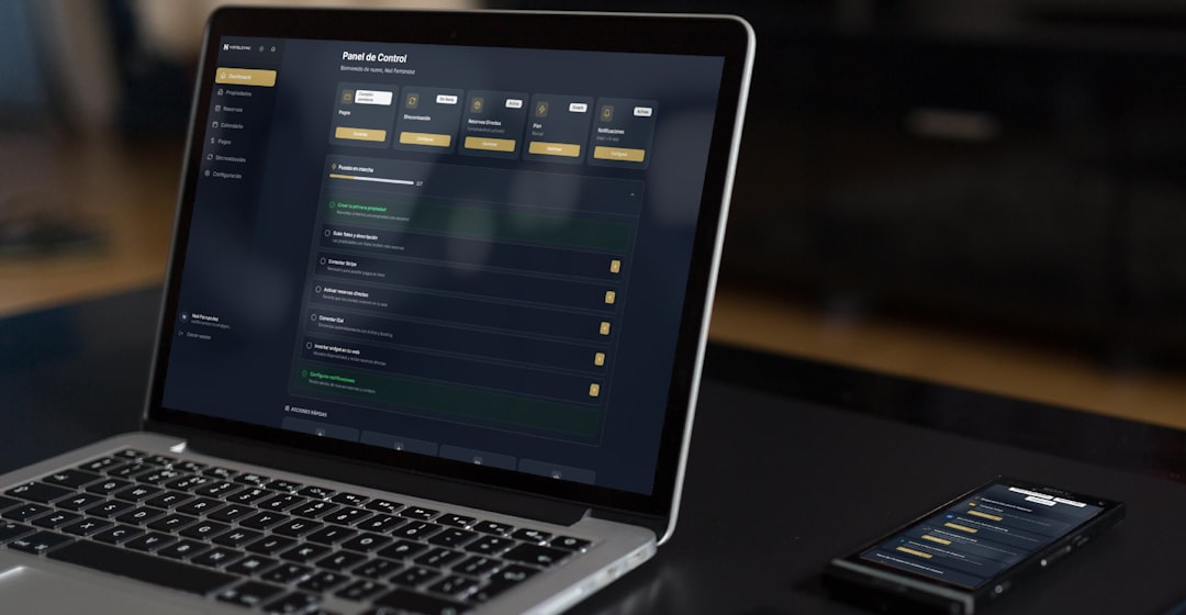 laptop and phone displaying financial data law office software dashboard attorneys