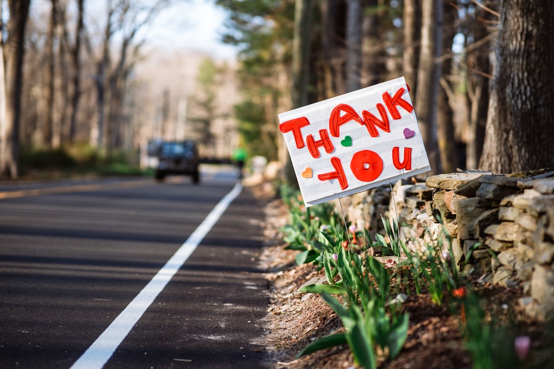 white and red no parking sign fundraising team donor thank you nonprofit office