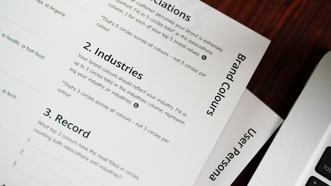 a computer keyboard sitting on top of a wooden table cover letter length recruiter review job application