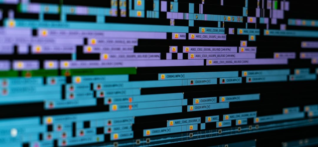 a digital video editing timeline with blue and purple clips on a black background color grading screen video editor creative project