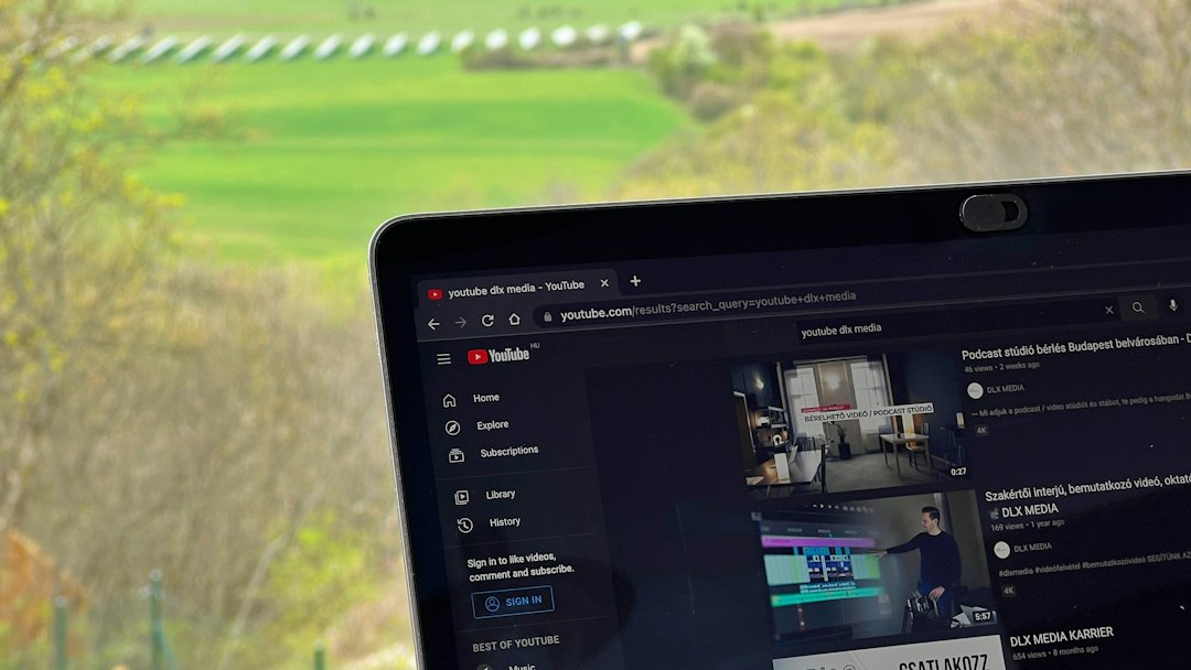a laptop computer sitting on top of a table youtube studio delete channel laptop screen