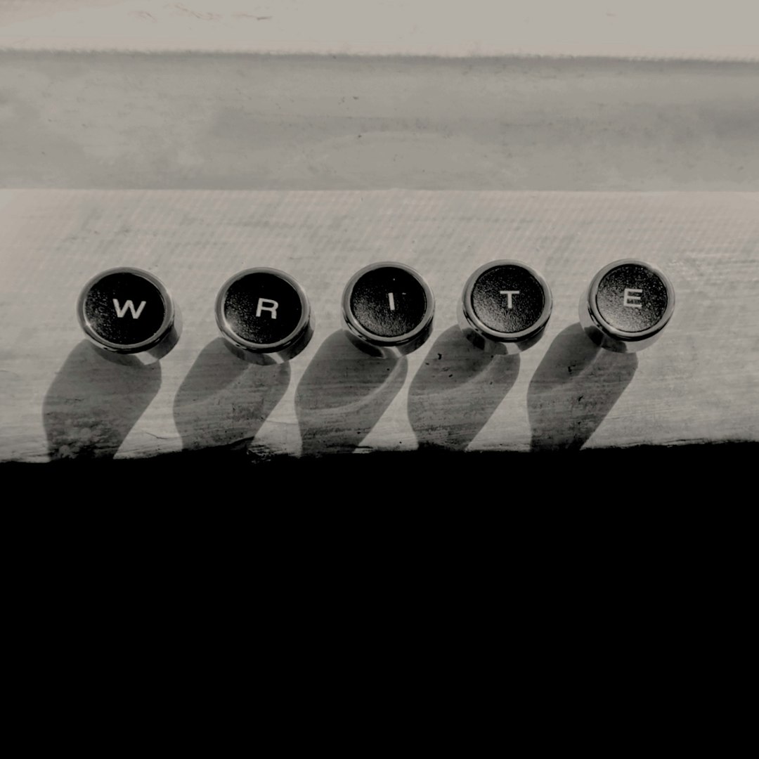 a row of metal knobs sitting on top of a wooden table ai writing tools editing workflow concise writing