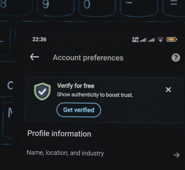 External Vulnerability Scanner: Qualys vs Tenable for Internet-Facing Asset Scanning 8 account preferences screen with verification prompt security dashboard access policies team devices