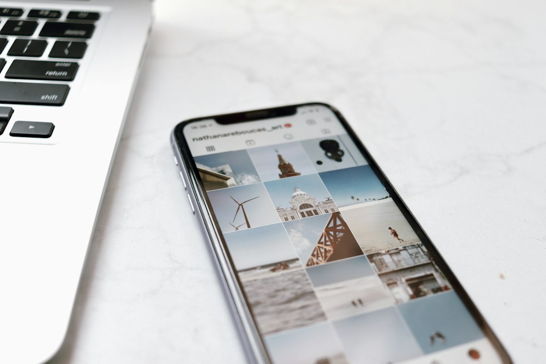 black android smartphone on white table instagram grid preview fashion posts content planner