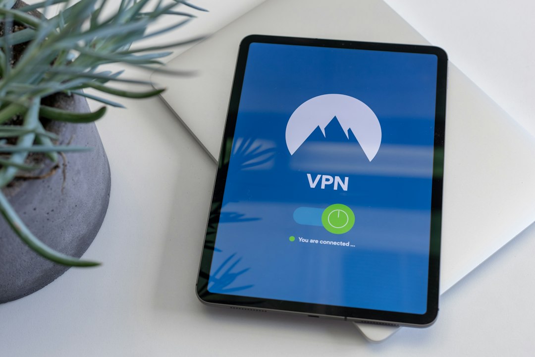 black tablet computer turned on displaying vpn vpn clients laptop phone router network access