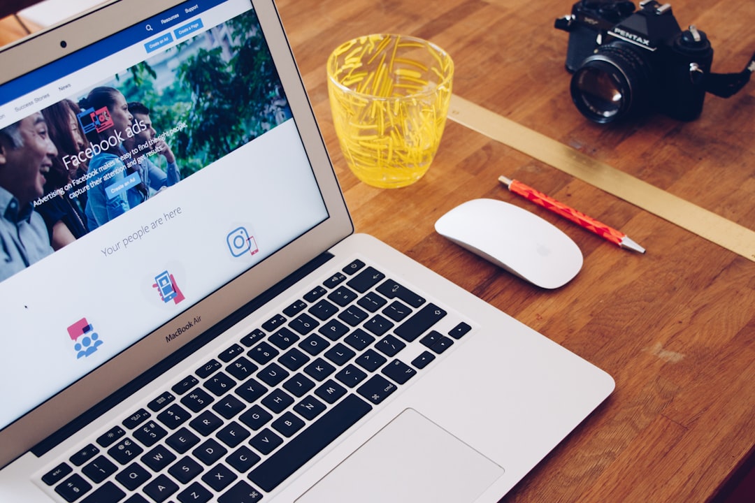 macbook air on table facebook ads dashboard ramadan schedule campaign timing