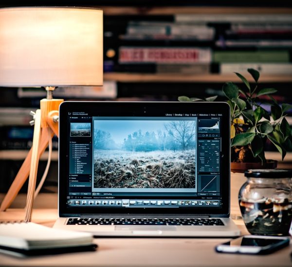 Two Weeks Notice Format: Microsoft Word vs Google Docs and Other Tools for Formatting a Resignation Letter 8 macbook pro on brown wooden table inside room content creator desk laptop editing social video